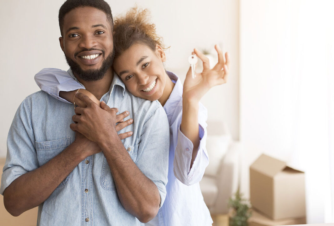 First-time buyers pictured with the keys to their new house