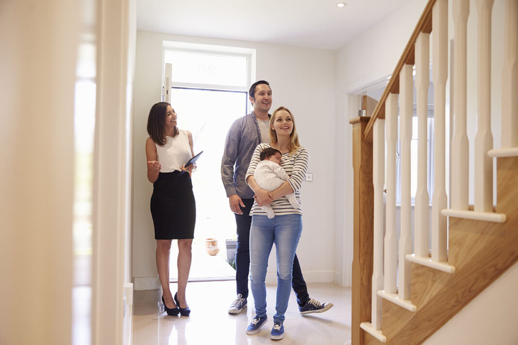 Family viewing a house