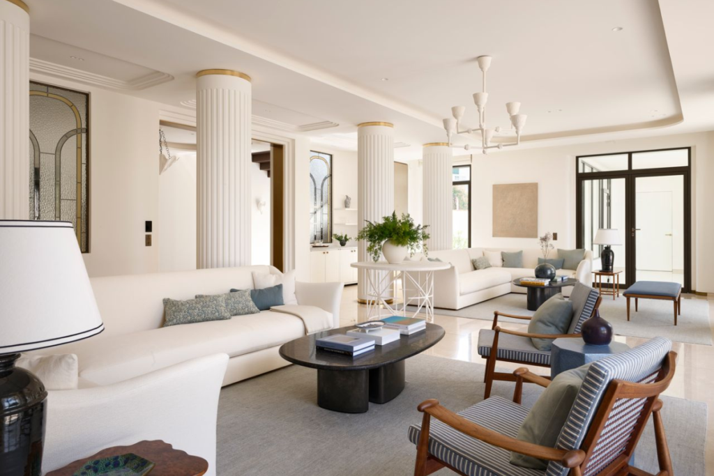 Villa Jardin, main reception room in Wallis blue pinstripe and colours with cream sofas