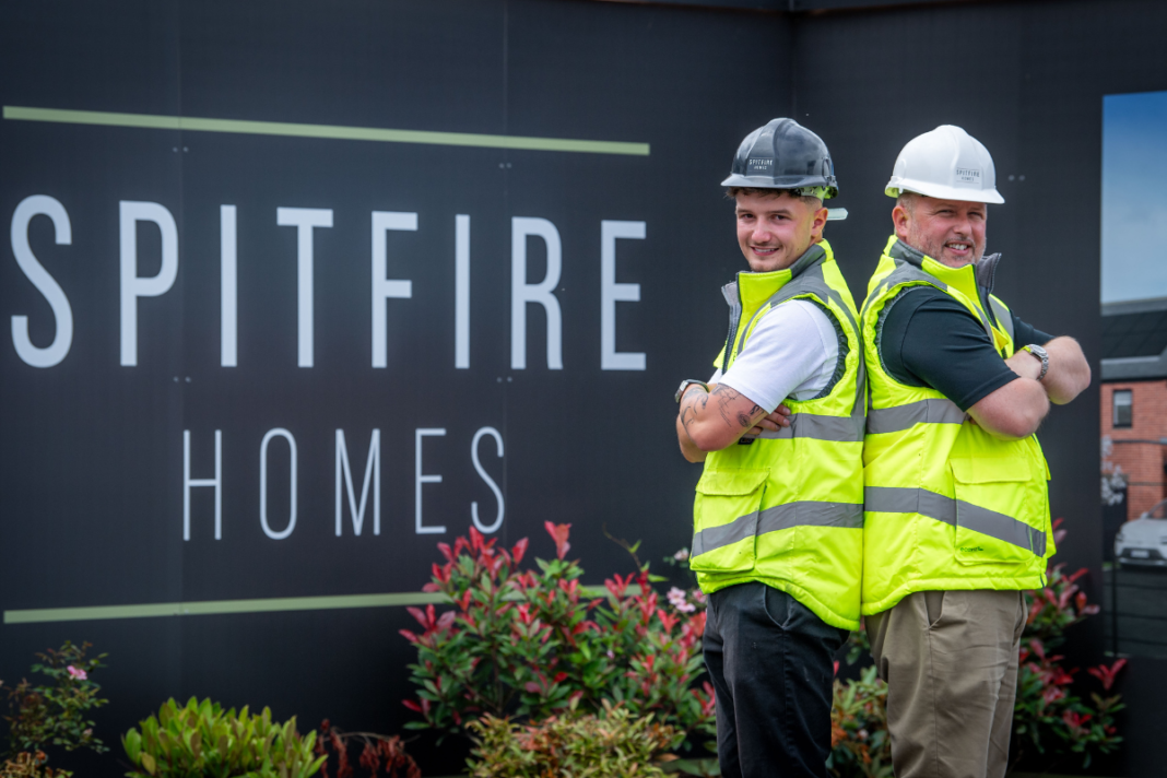 Construction runs in the family at Spitfire Homes Steve and Harry Beach outside a Spitfire Homes development