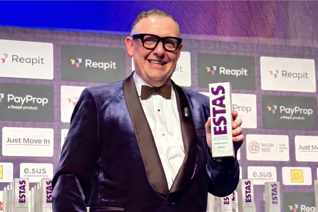 Reapit’s PayProp takes ninth consecutive ESTAS title Dr Neil Cobbold, Reapit's commercial director collecting the ESTAS award for Best in Sector – Payment Services